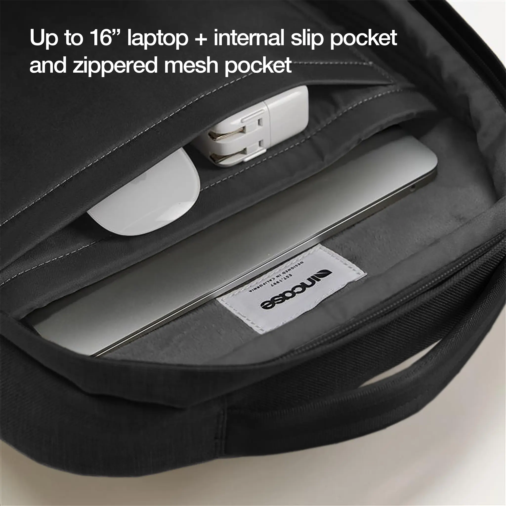 Photo of interior of Crosstown Backpack with Woolenex 20L Incase with higlighted 16-inch laptop fit and internal slip pocket