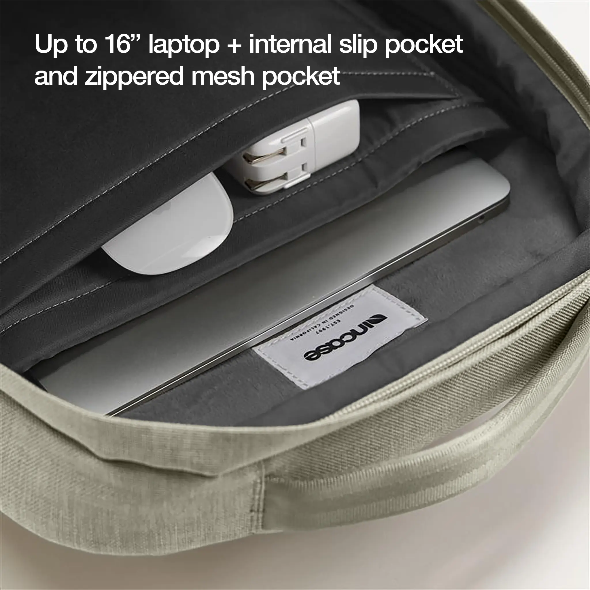 Photo of interior of Crosstown Backpack with Woolenex 20L Incase with higlighted 16-inch laptop fit and internal slip pocket