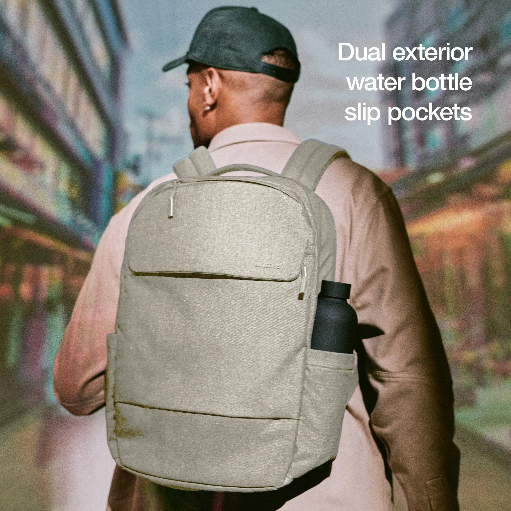 Crosstown Backpack with Woolenex 20L Incase highlighting the dual exterior water bottle slip pockets