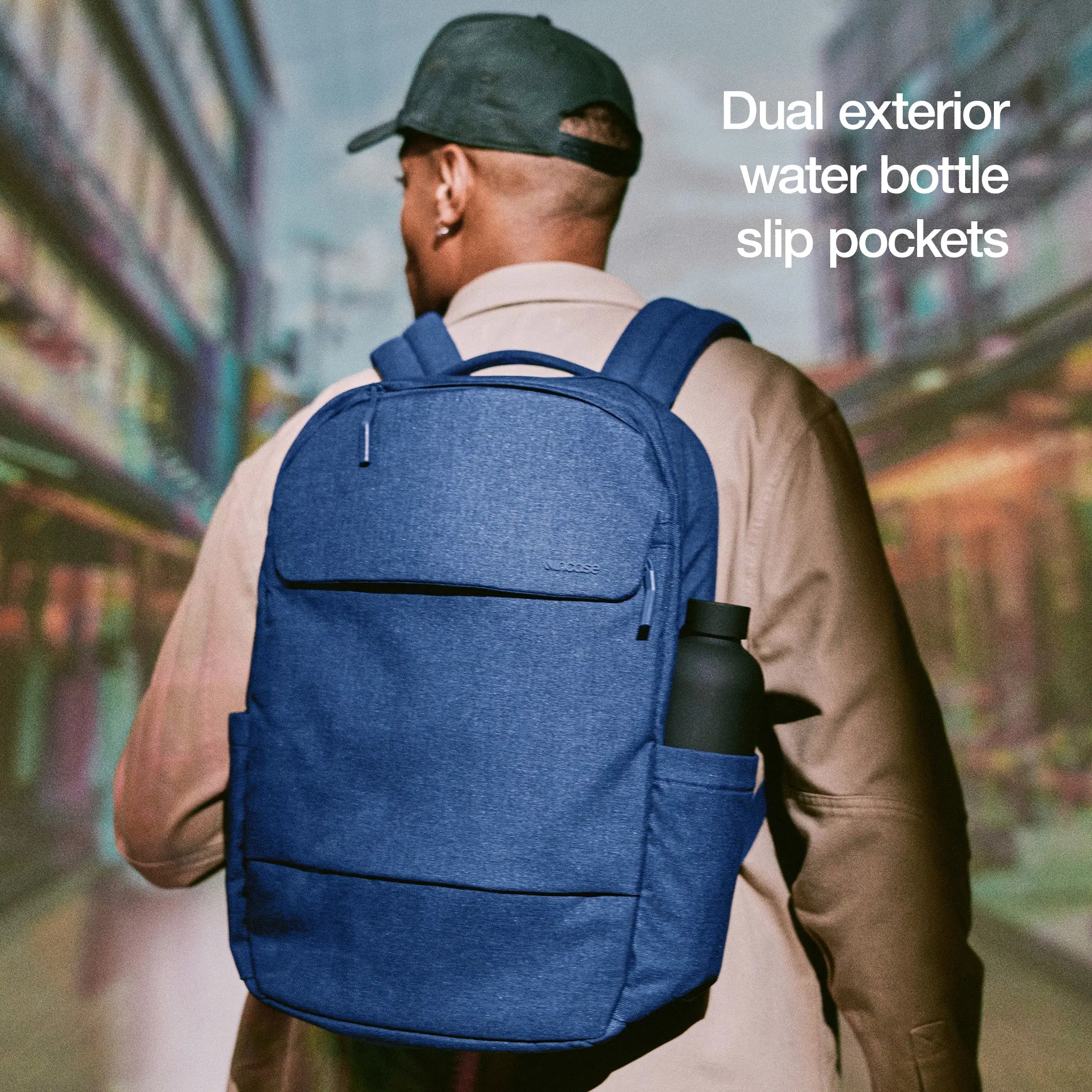 Crosstown Backpack with Woolenex 20L Incase highlighting the dual exterior water bottle slip pockets