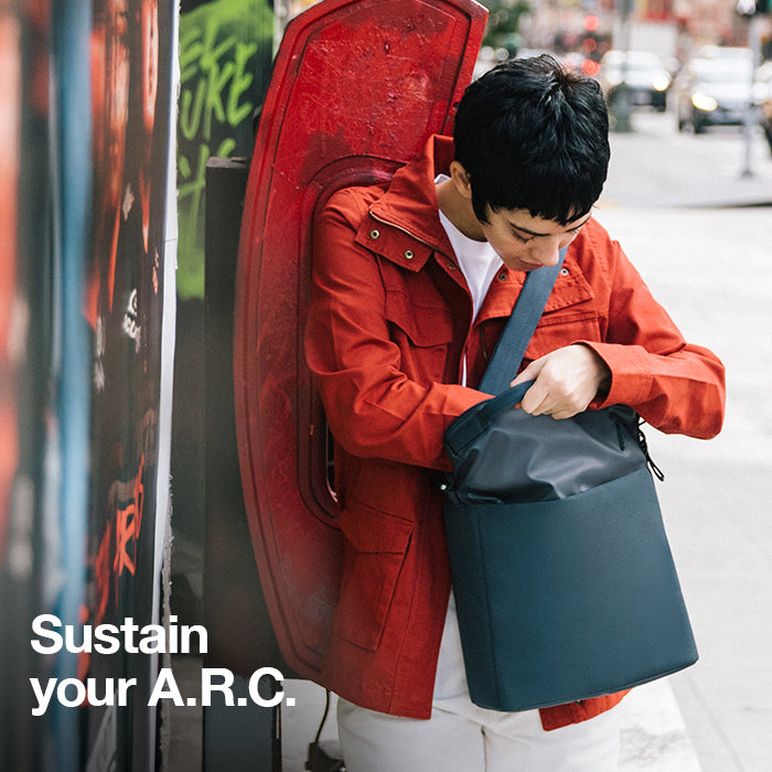 Person looking through the accessible A.R.C. Tech Tote