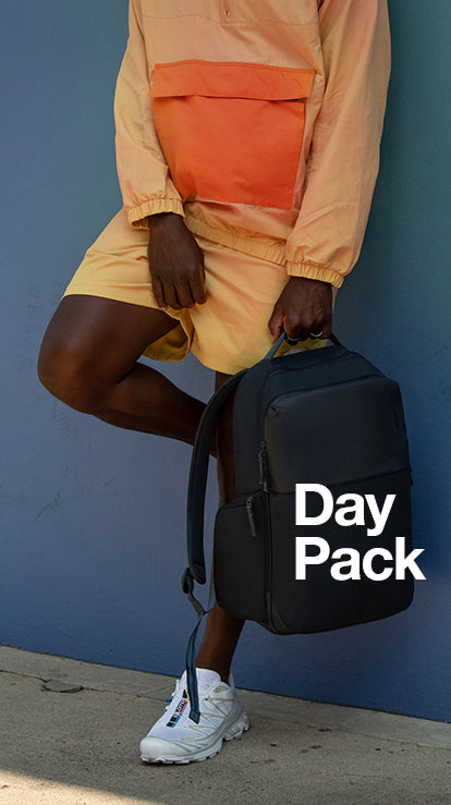 A.R.C. Daypack feature image person holding backpack